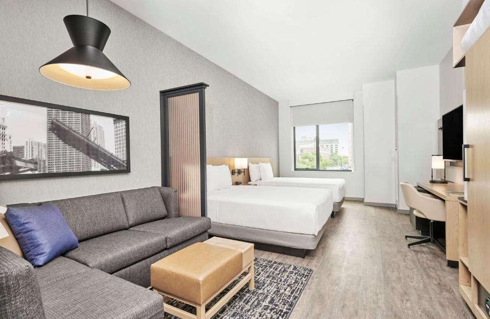 Queen Room with Two Queen Beds and Sofa Bed interior